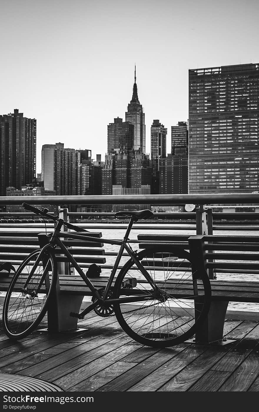 Black Road Bike Beside Bench