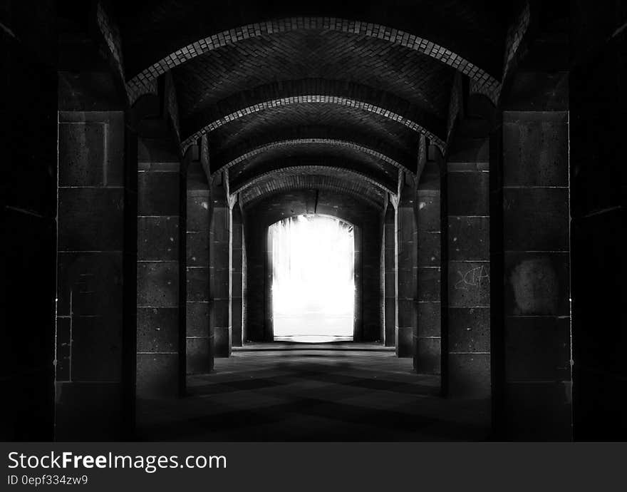 Black and White Photo of a Tunnel