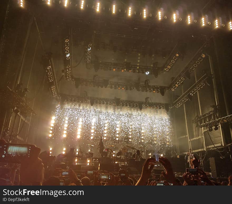 People Inside Building With Lights Watching Concert