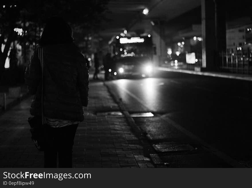 Black Bus Approaching during Nighttime