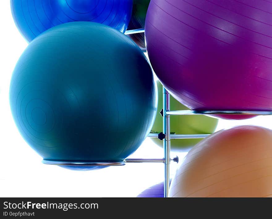 Blue Exercising Ball on Stainless Steel Exercising Ball Rack