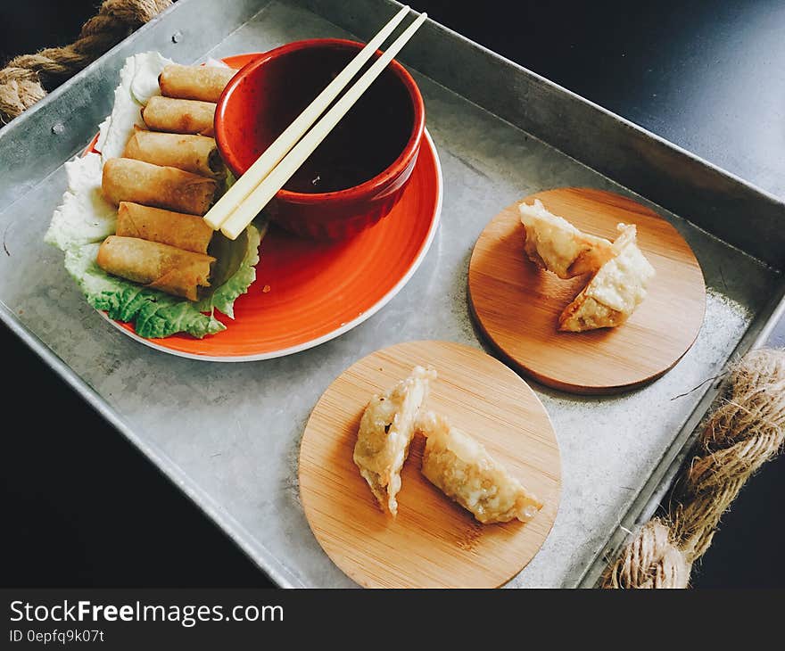 Fried Spring Rolls and Dumplings on Top of Tray