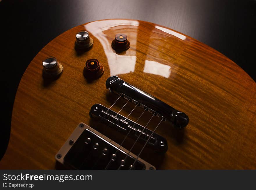 Product Photography of Brown Electric Guitar