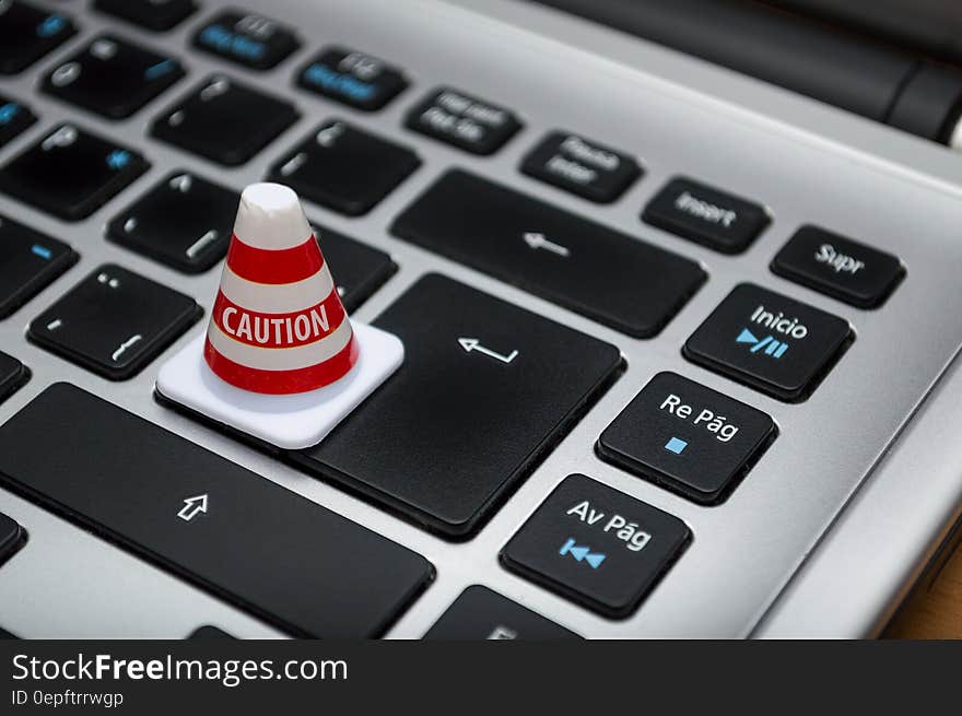 White Caution Cone on Keyboard