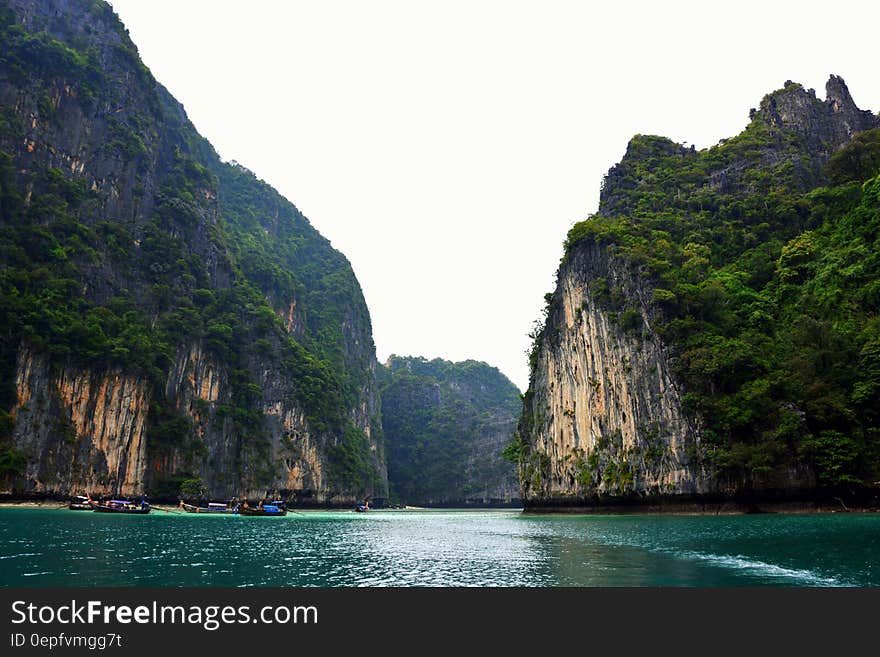 Cliff faces along coastline of blue waters. Cliff faces along coastline of blue waters.