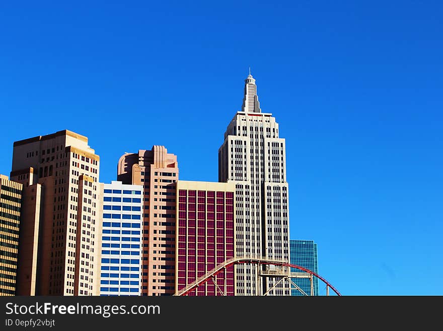 White Red and Brown High Rise Building