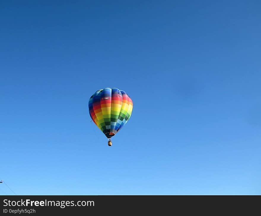 Colorful hot air balloon in blue skies. Colorful hot air balloon in blue skies.