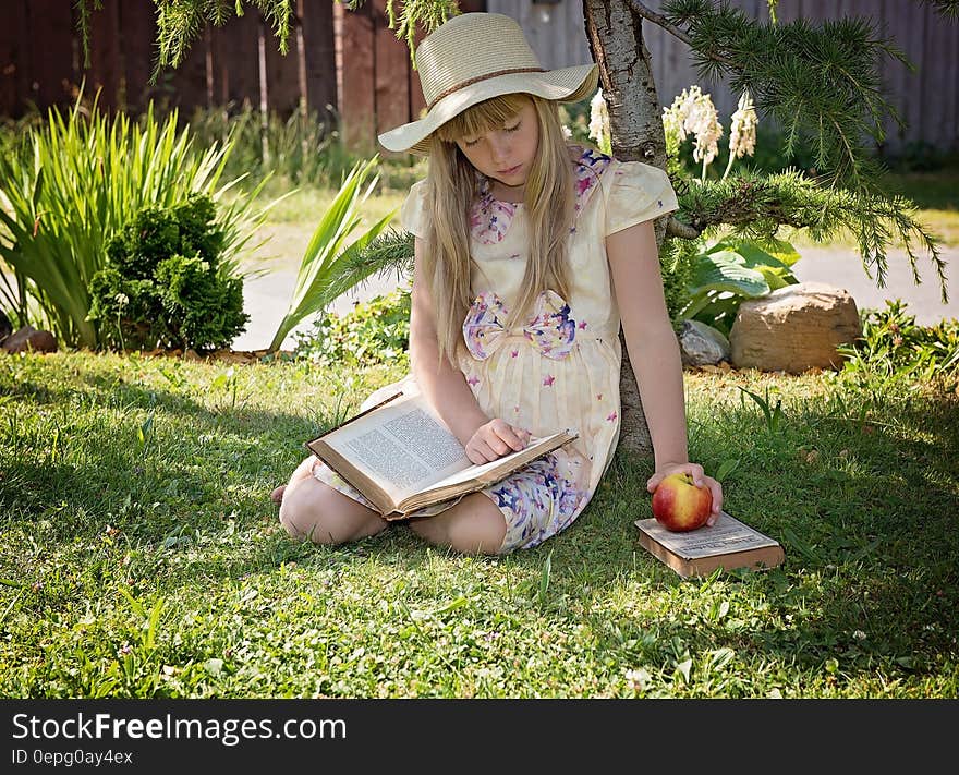 Girl Wearing White Purple and Pink Floral Short Sleeve Dress