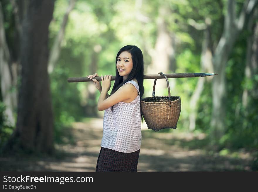 Portrait of Smiling Woman in Forest