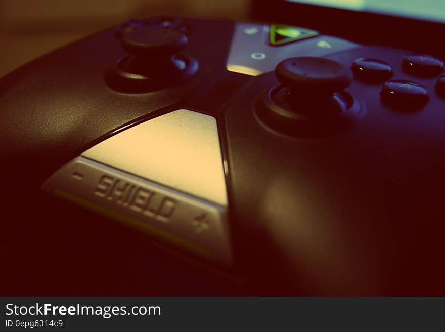 Close up of buttons and knobs of gaming control console. Close up of buttons and knobs of gaming control console.