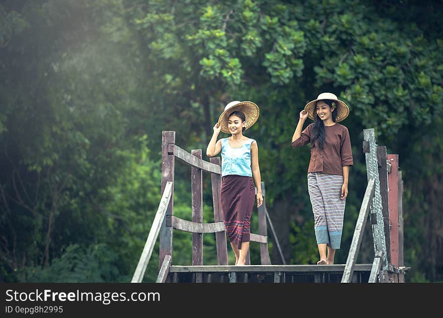 Full Length of a Smiling Young Woman in Forest