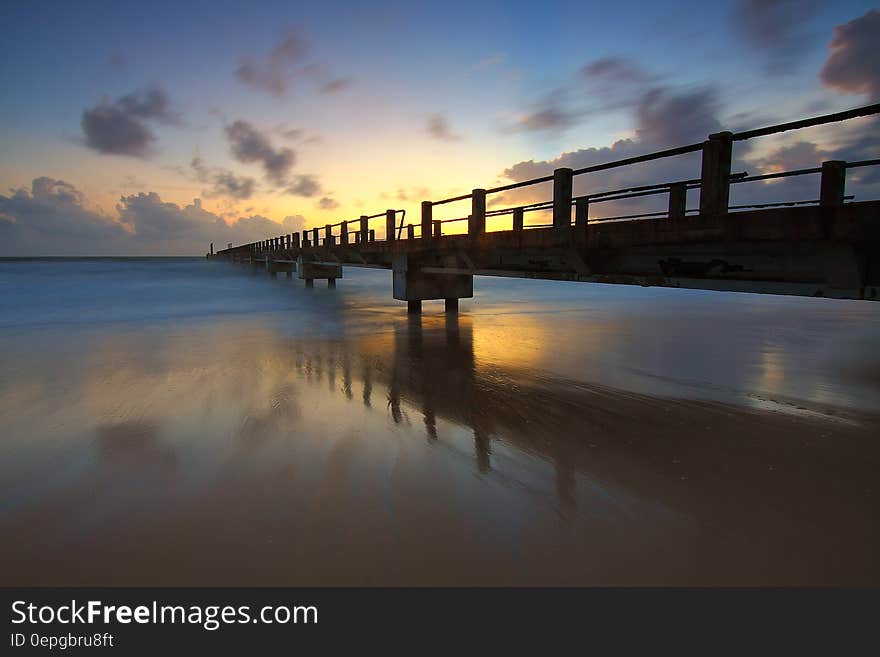 Scenic View of Sea Against Sky at Sunset