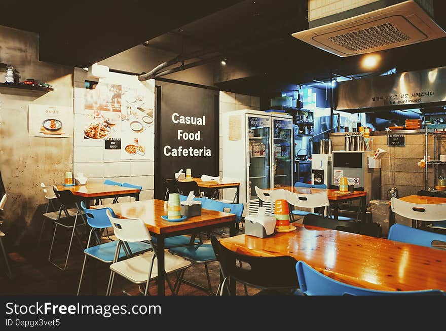 Empty table and chairs inside modern cafe. Empty table and chairs inside modern cafe.