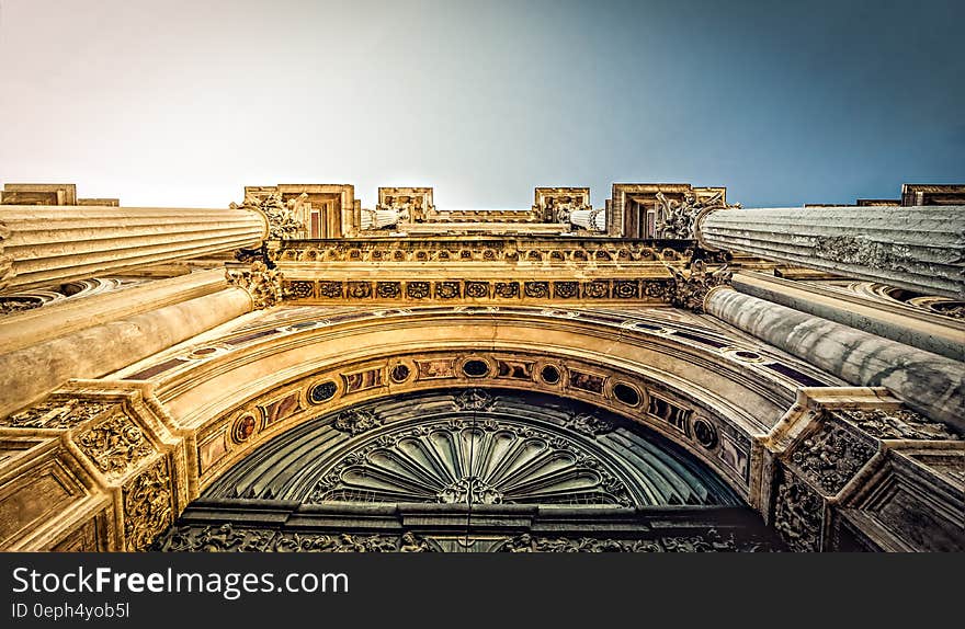 Bottom View of Vintage Arch during Daytime