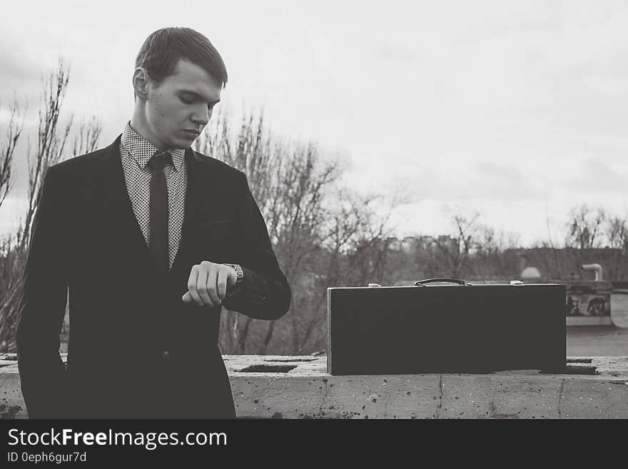 Young Man Standing Against Sky