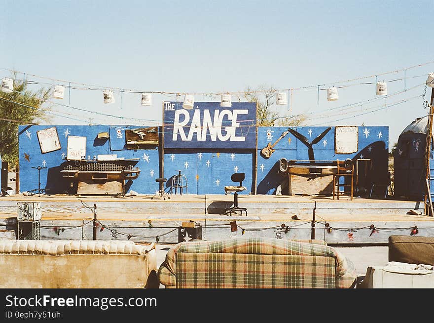 Western themed theater stage with old sofas on sunny day. Western themed theater stage with old sofas on sunny day.