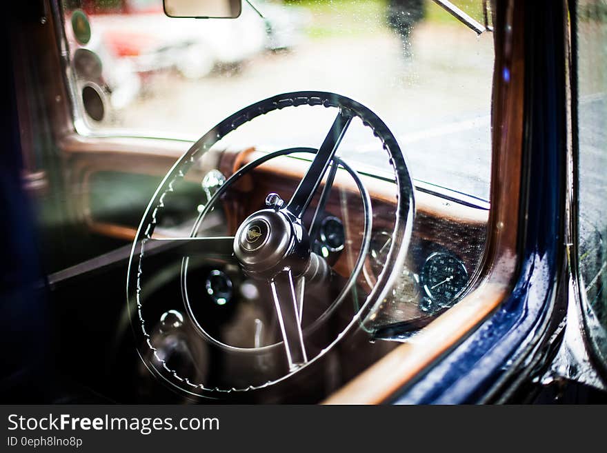 Grey Car Steering Wheel during Daytime