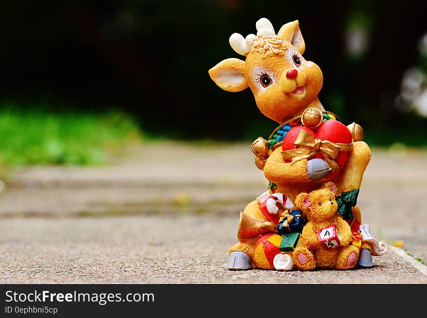 Brown Deer Figurine at Daytime