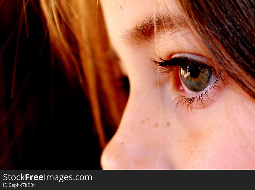 Close up on green eyes of redheaded child. Close up on green eyes of redheaded child.