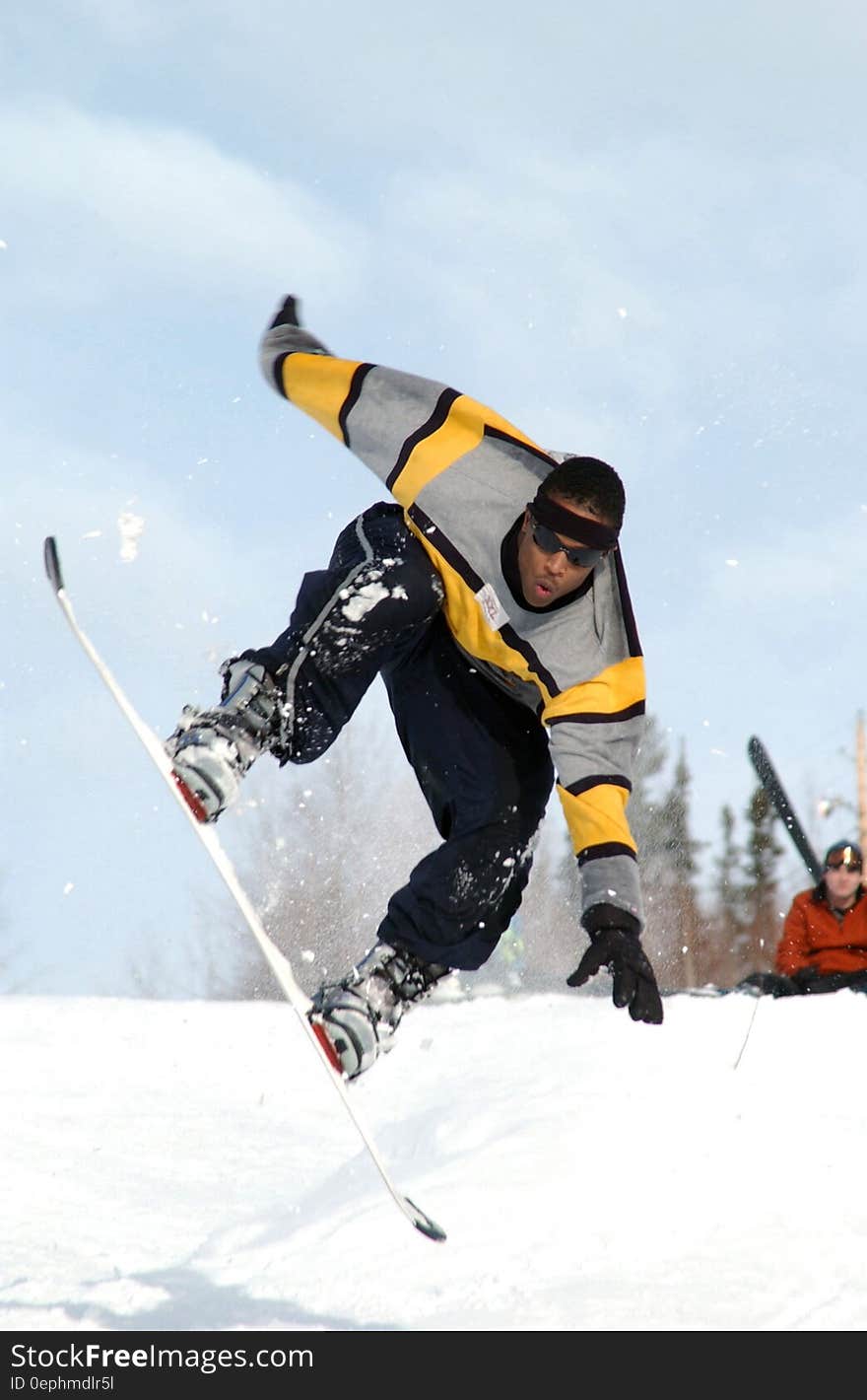 Man Riding a White Snowboard during Daytime