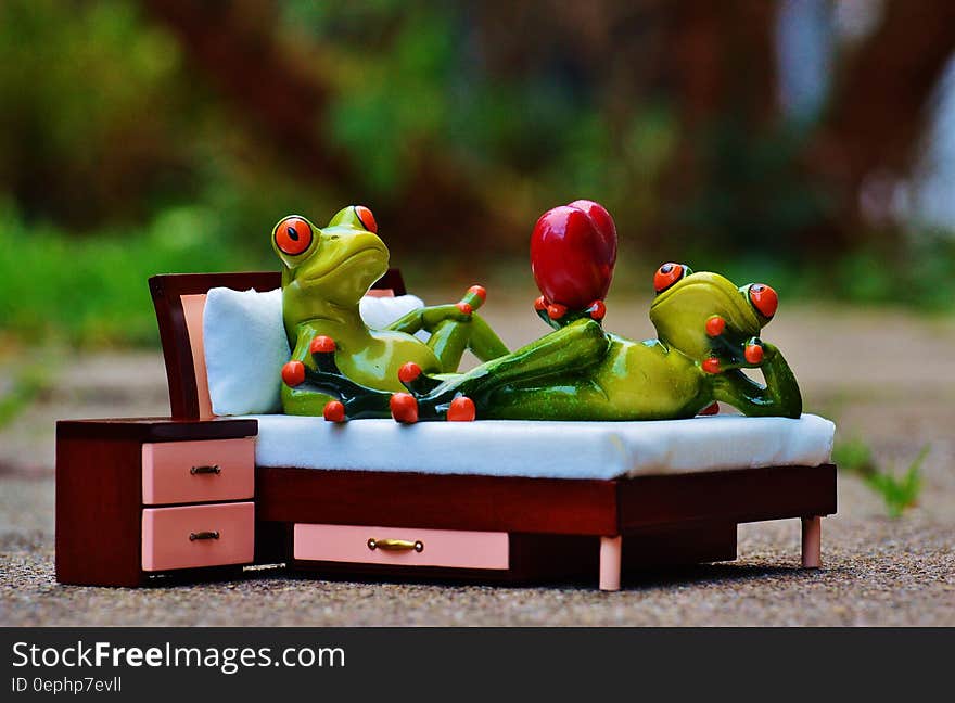 2 Green Frog on Bed Figurine