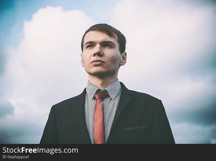 Portrait of Young Man Against Sky