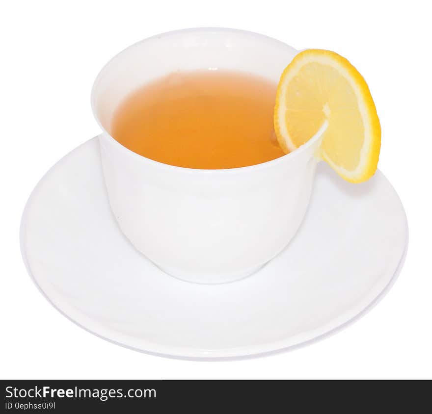 Sliced Lemon on White Ceramic Cup With Tea