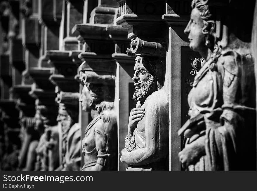 A set of Renaissance sculptures in black and white.