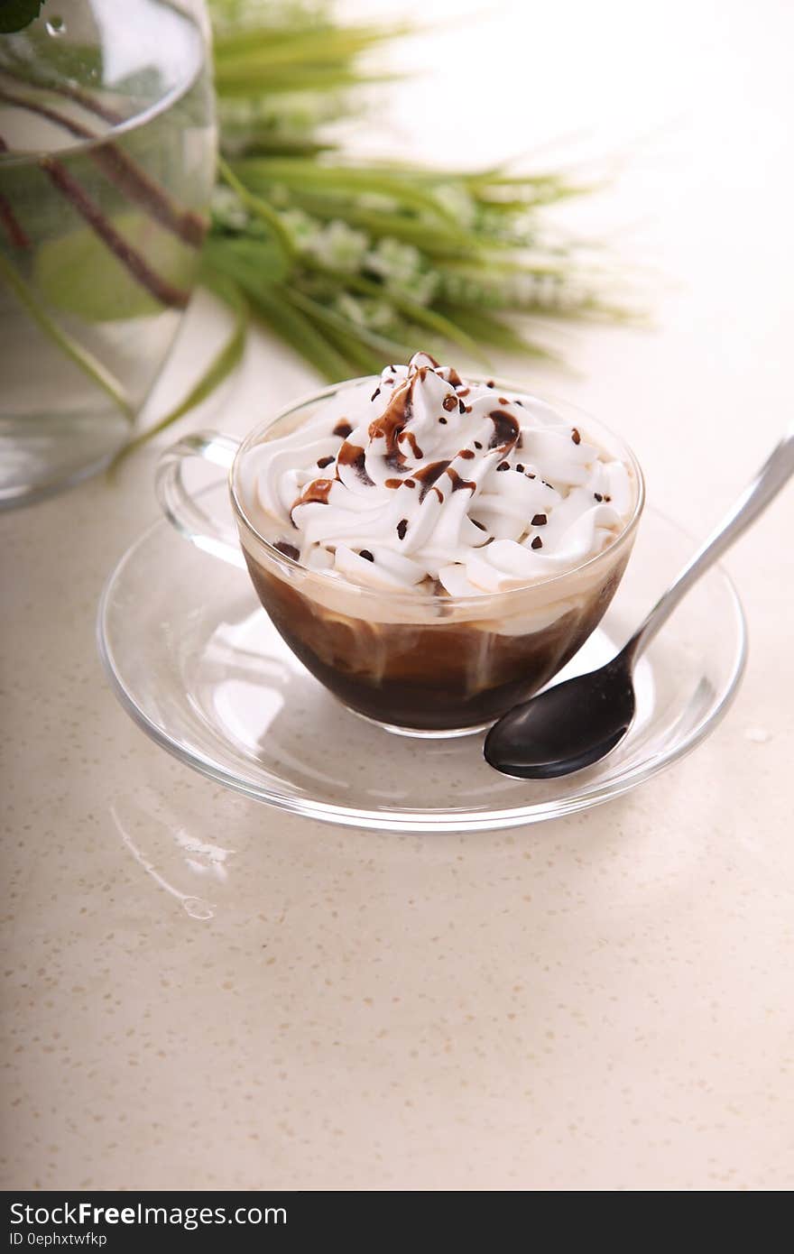 Black White Spoon on Clear Glass Plate