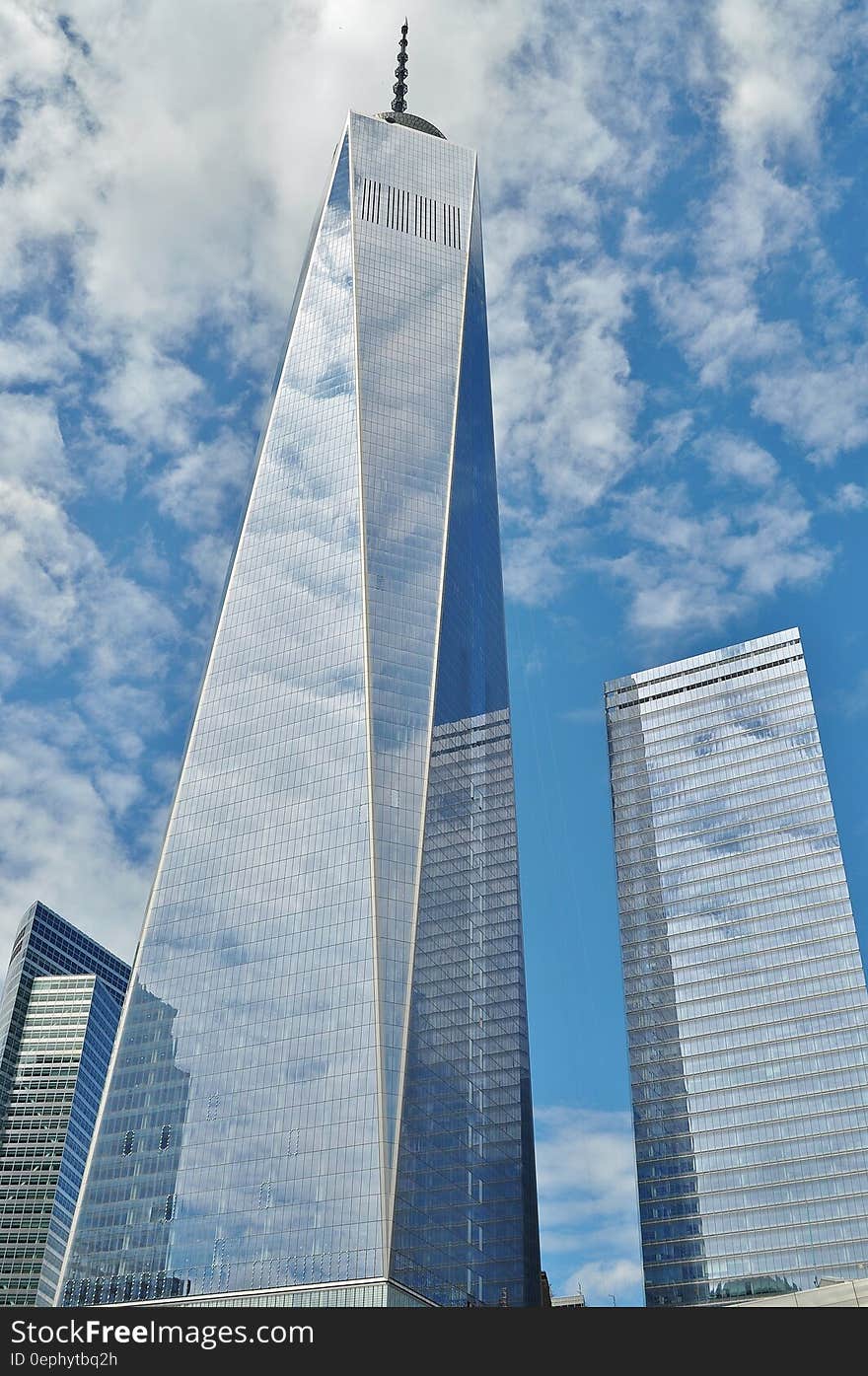 Curtain Wall Buildings Under Blue Cloudy Sky