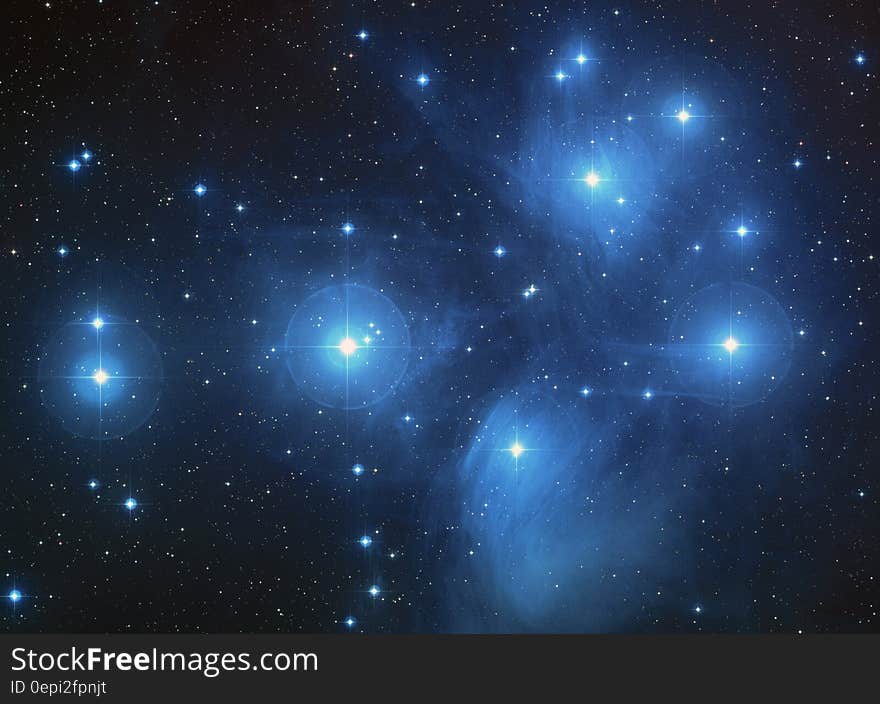 Pleiades constellation on the night sky.