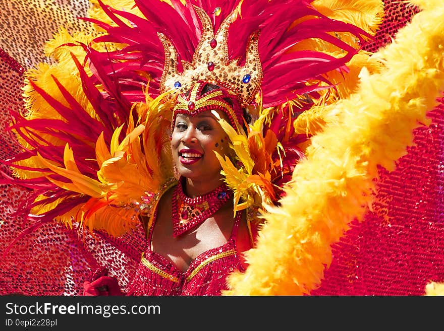 Woman Wearing Yellow Pink Costume