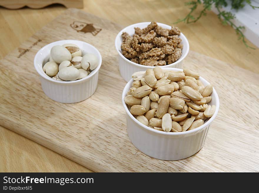 Brown Nuts on White Ceramic Bowl