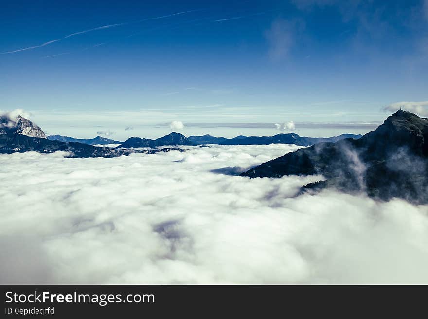 Black Mountain over White Clouds