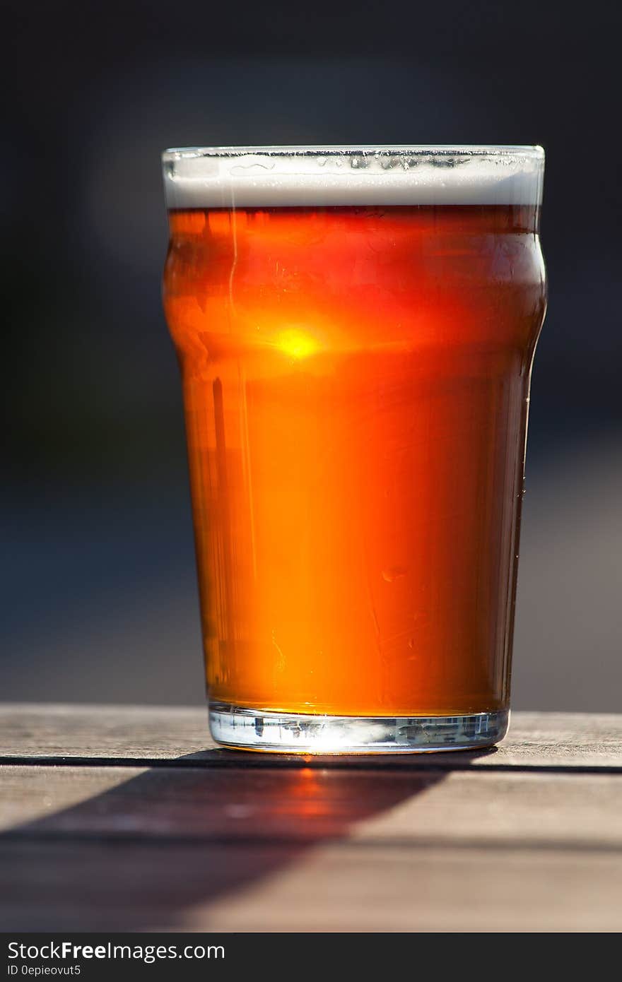 Red Beverage in Clear Drinking Glass