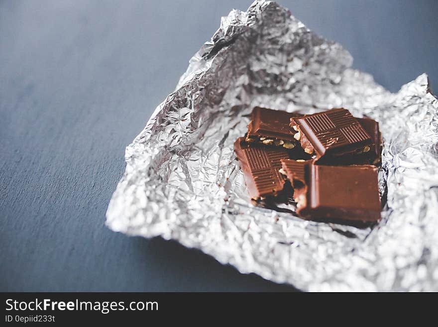 Chocolate pieces on aluminum foil