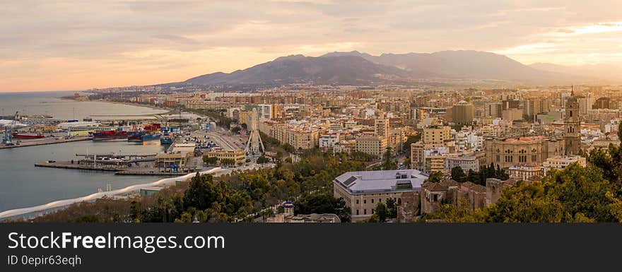 Coastal town of Malaga, Spain at sunset.