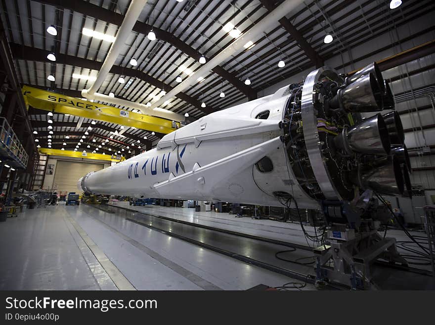 Falcon 9 rocket in Spacex hangar. Falcon 9 rocket in Spacex hangar.