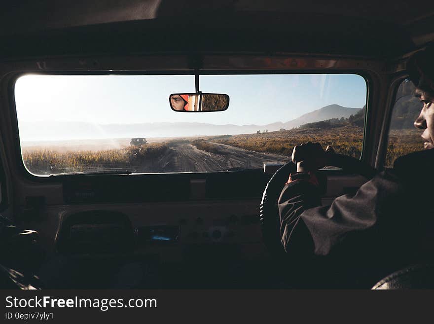 Man Driving His Car