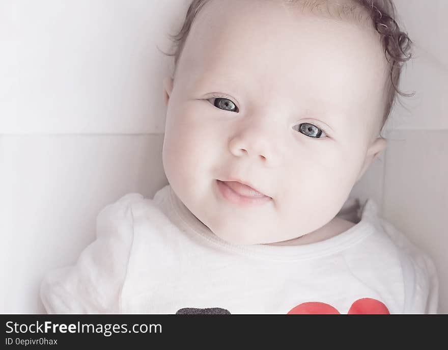 Baby Wearing White Red and Black T Shirt