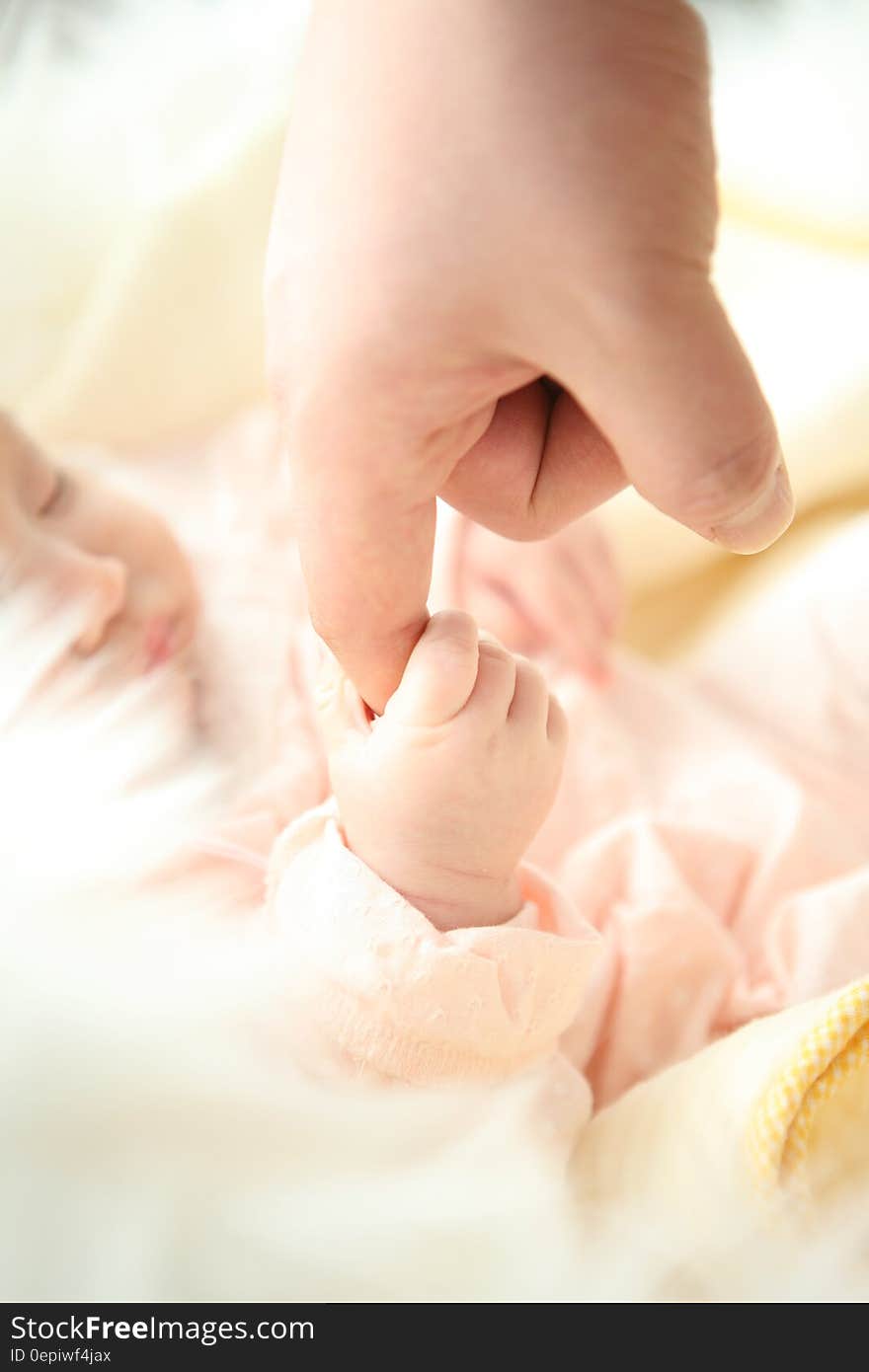 Baby Holding Person&#x27;s Index Finger