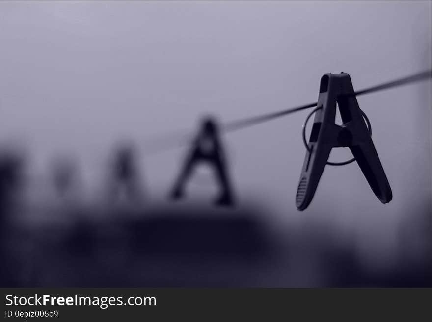 Gray Scale Image of Clothes Pin on Clothe&#x27;s Line