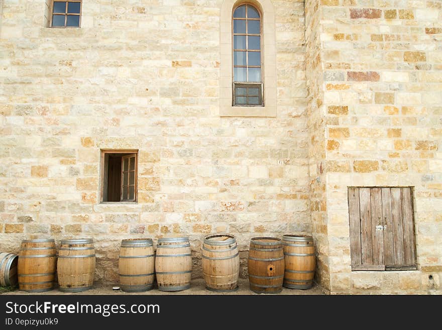 Seven whisky barrels standing beside the castle walls collected as vessels in which to store wine while it matures. Seven whisky barrels standing beside the castle walls collected as vessels in which to store wine while it matures.