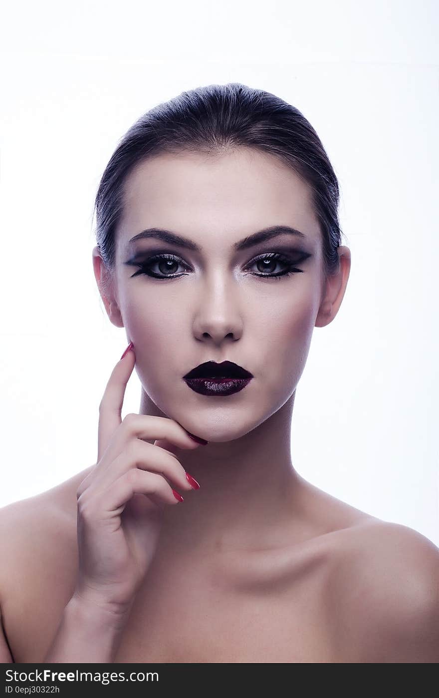 Naked Woman in Black Eyeliner and Maroon Lips