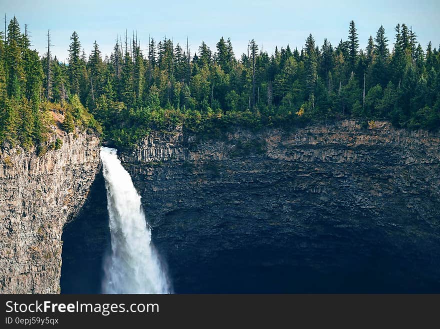 Green Trees Above Mountain and Falls during Daytime