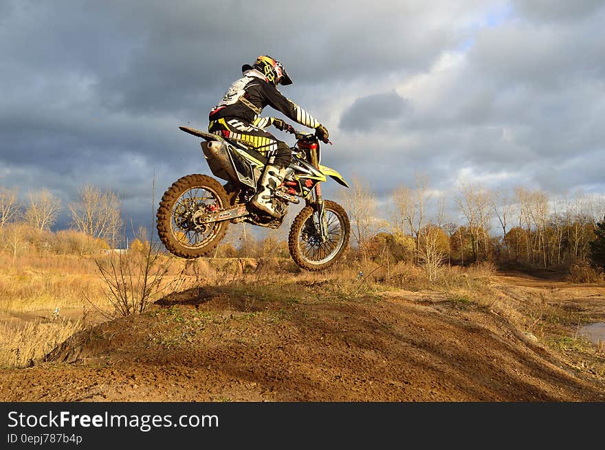 Motocross Rider on His Dirt Bike during Daytime