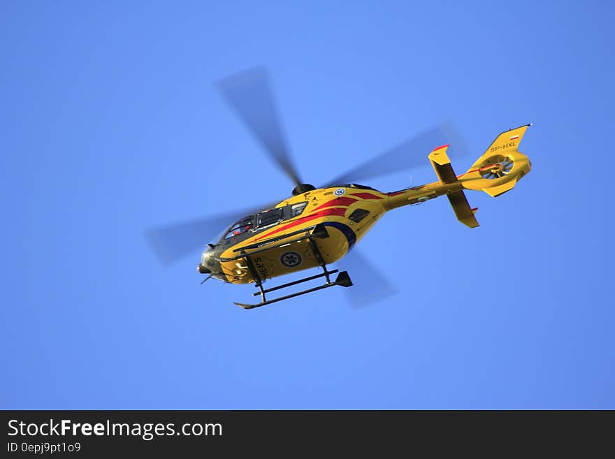 Yellow Hellicopter Flying