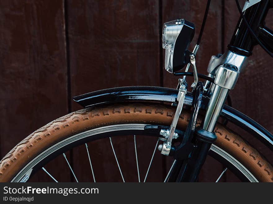 Close up on frame and wheel of bicycle. Close up on frame and wheel of bicycle.