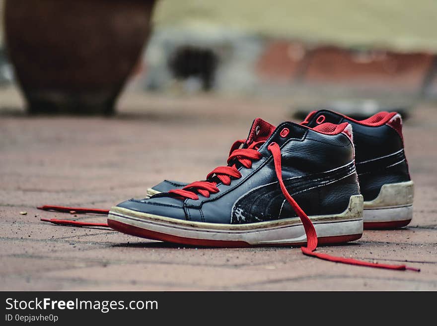 Black and Red Leather Puma Lace Up High Top Shoes