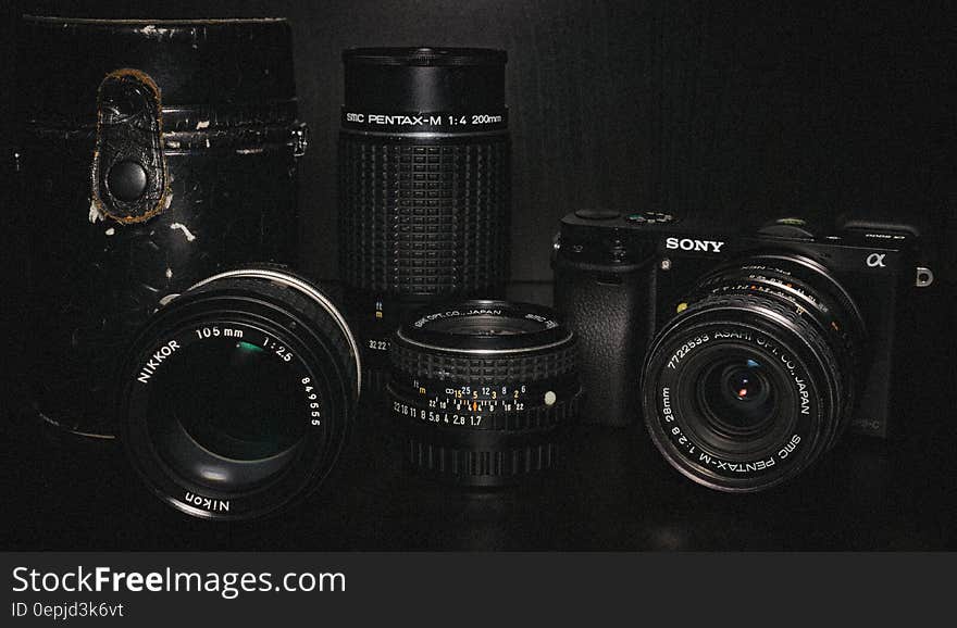 Black Sony Dslr Camera and Lens